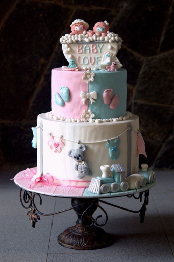 Two Tier Boy and Girl Shower Taking Cake