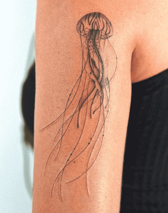 Jellyfish tattoo on Bicep