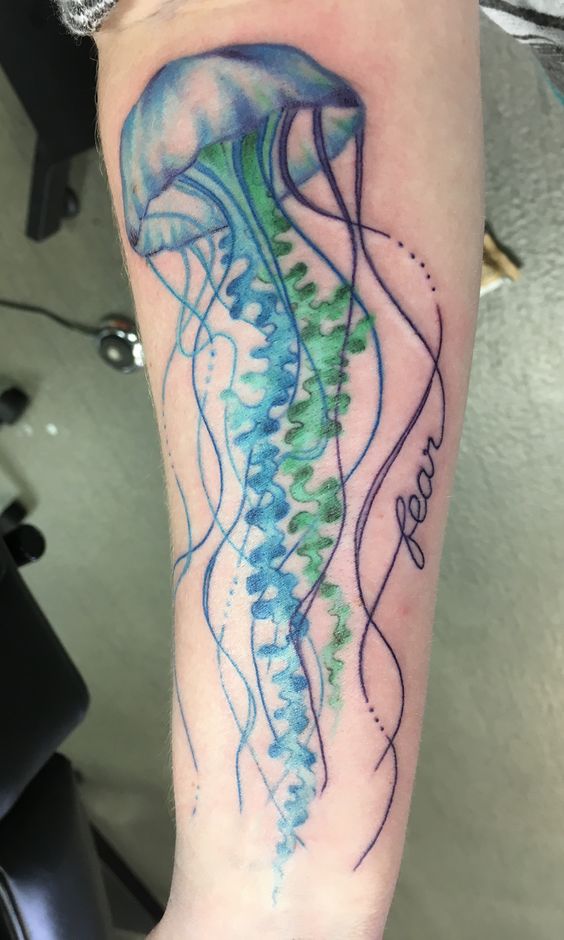Blue and Green Colored Jellyfish Tattoo