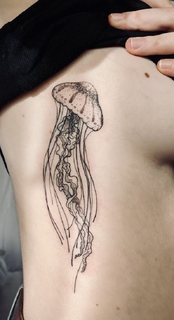 Jellyfish Tattoo below on Chest