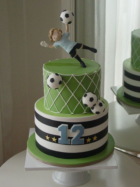 Two Tier Cake with Goal keeper on it